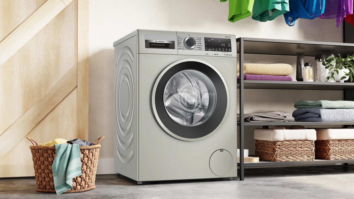 Bosch WGA2540XME Silver inox washing machine in a fitted laundry room