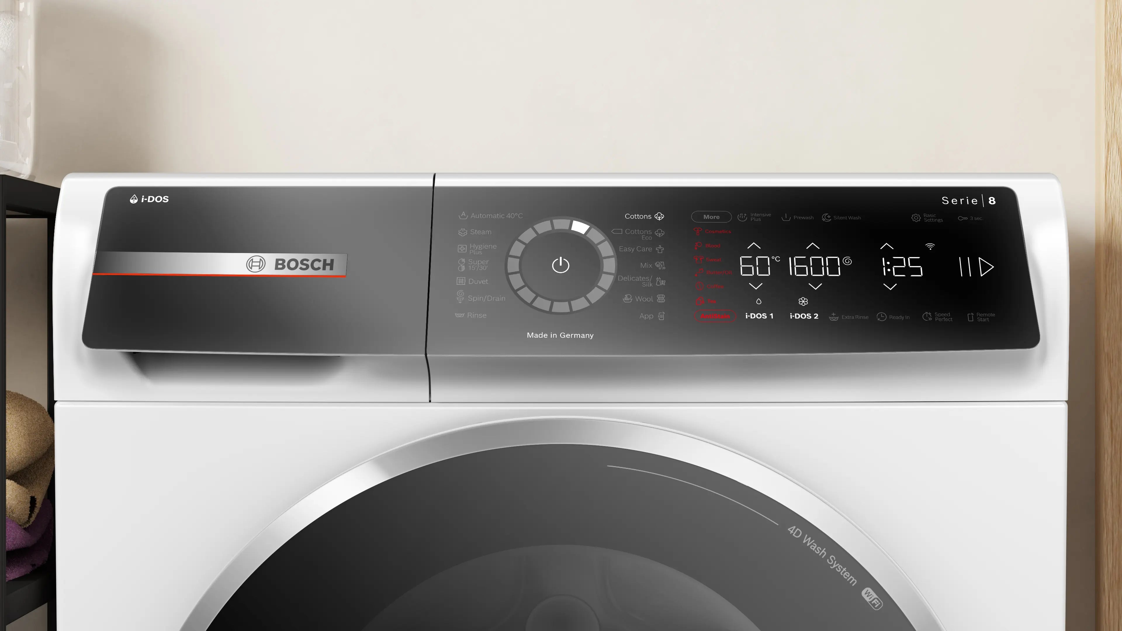 Bosch WGB256A0ME front-loading washing machine in white - angled front view