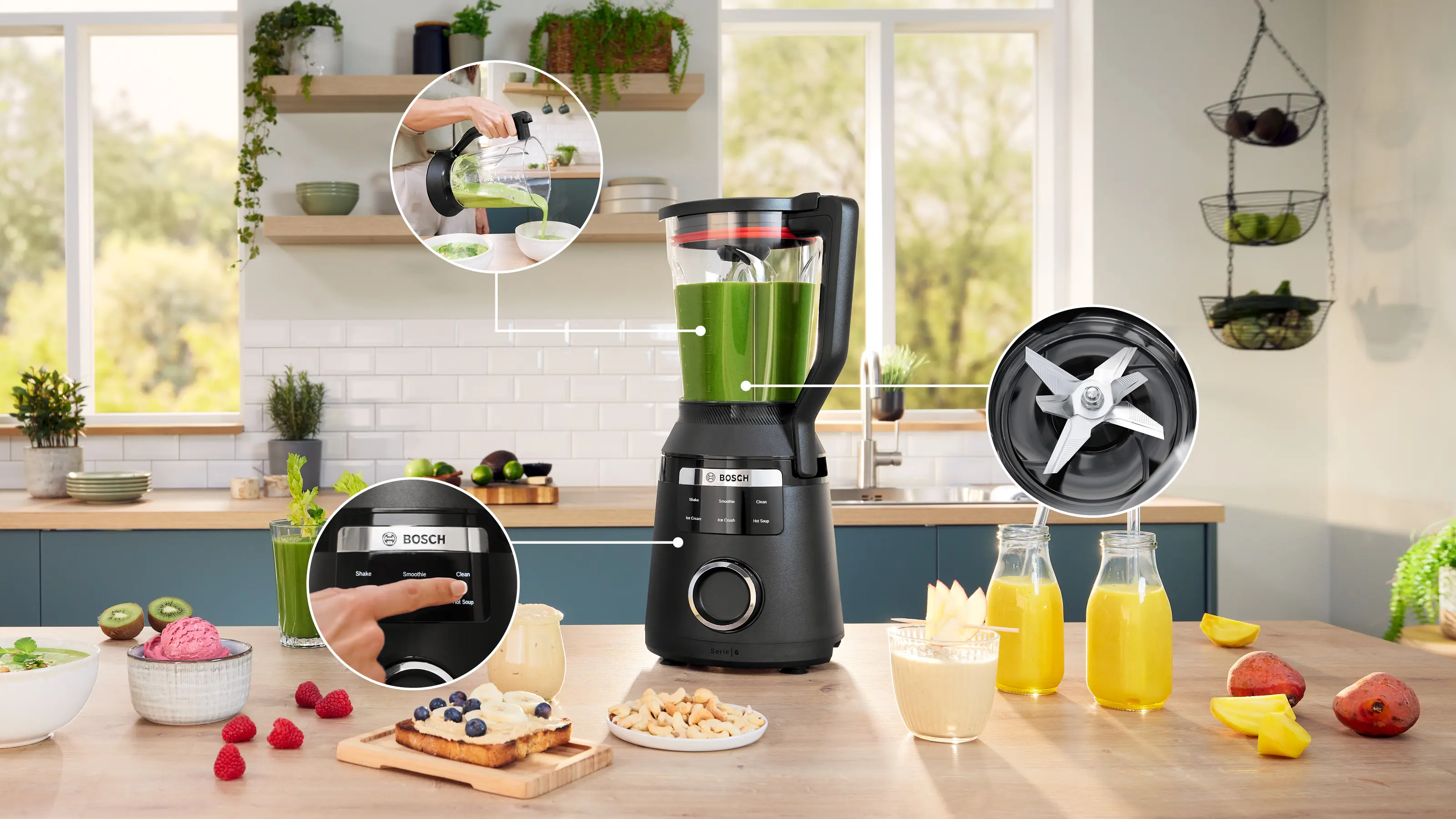 Blender on a kitchen counter with ingredients and a close-up of the brand logo.