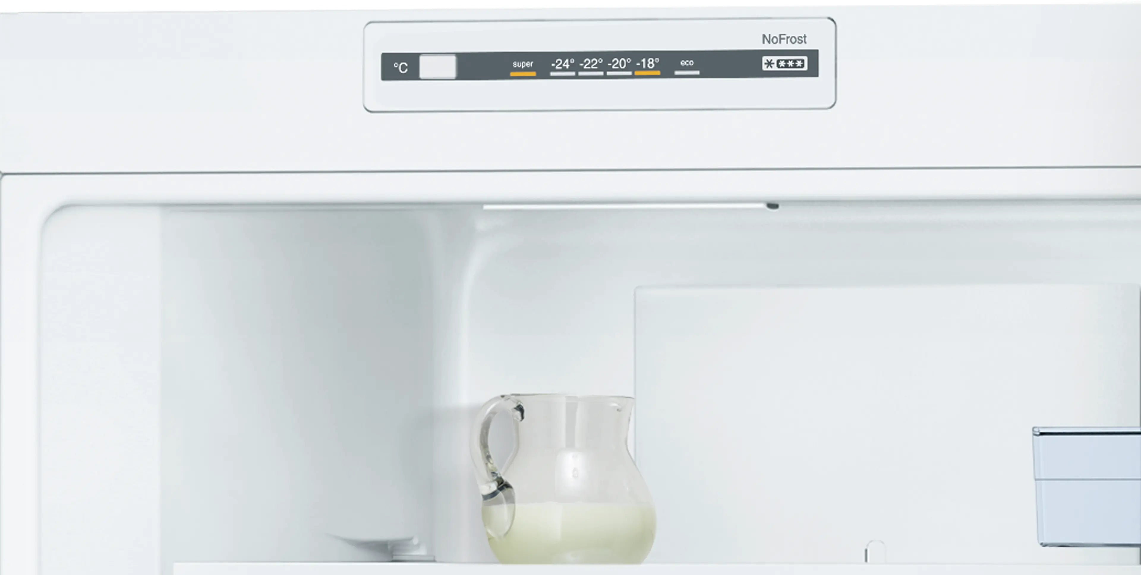 Bosch KGN33NW21U bottom-freezer fridge-freezer interior and storage view