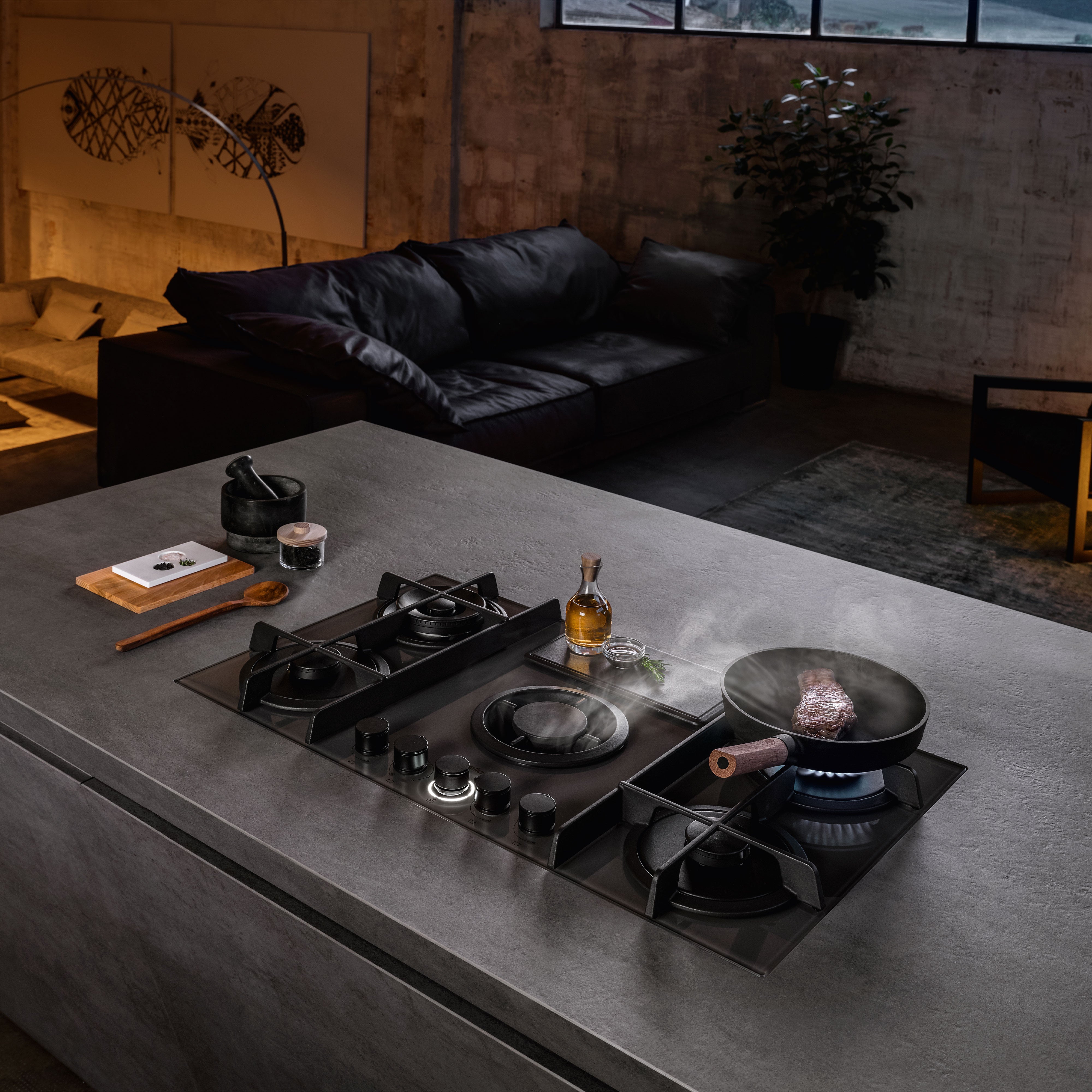 Elica NIKOLATESLA FLAME BL black glass hob design detail for the 90cm gas hob with integrated extractor in black glass.