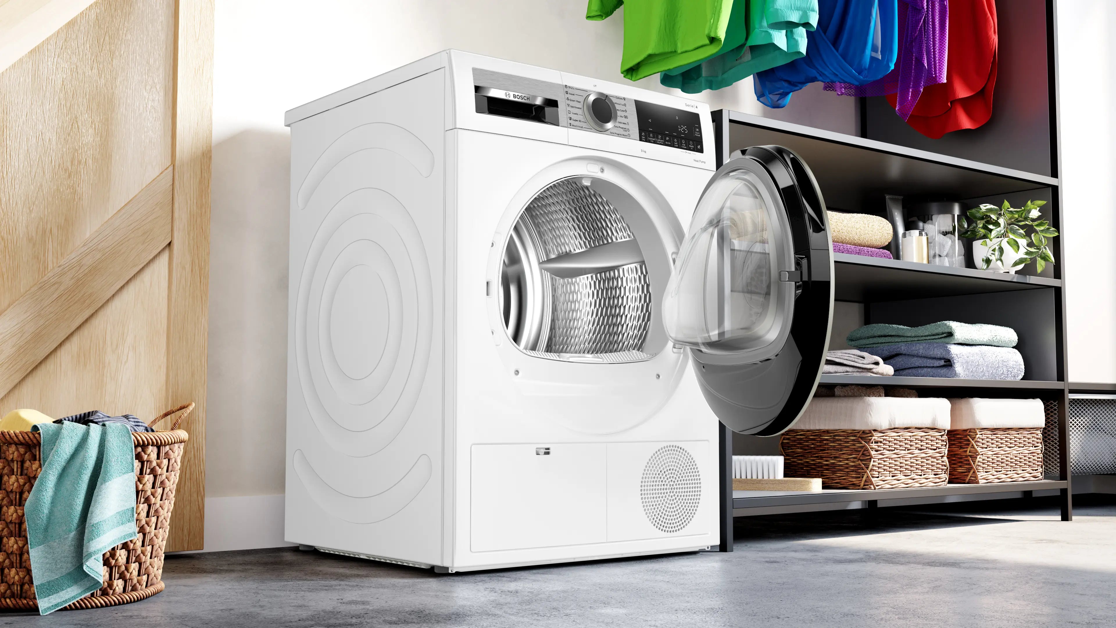 Bosch WQG1420AME heat pump tumble dryer in white - product detail view