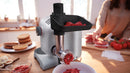 Bosch MUM58359 with meat grinder attachment producing fresh minced beef